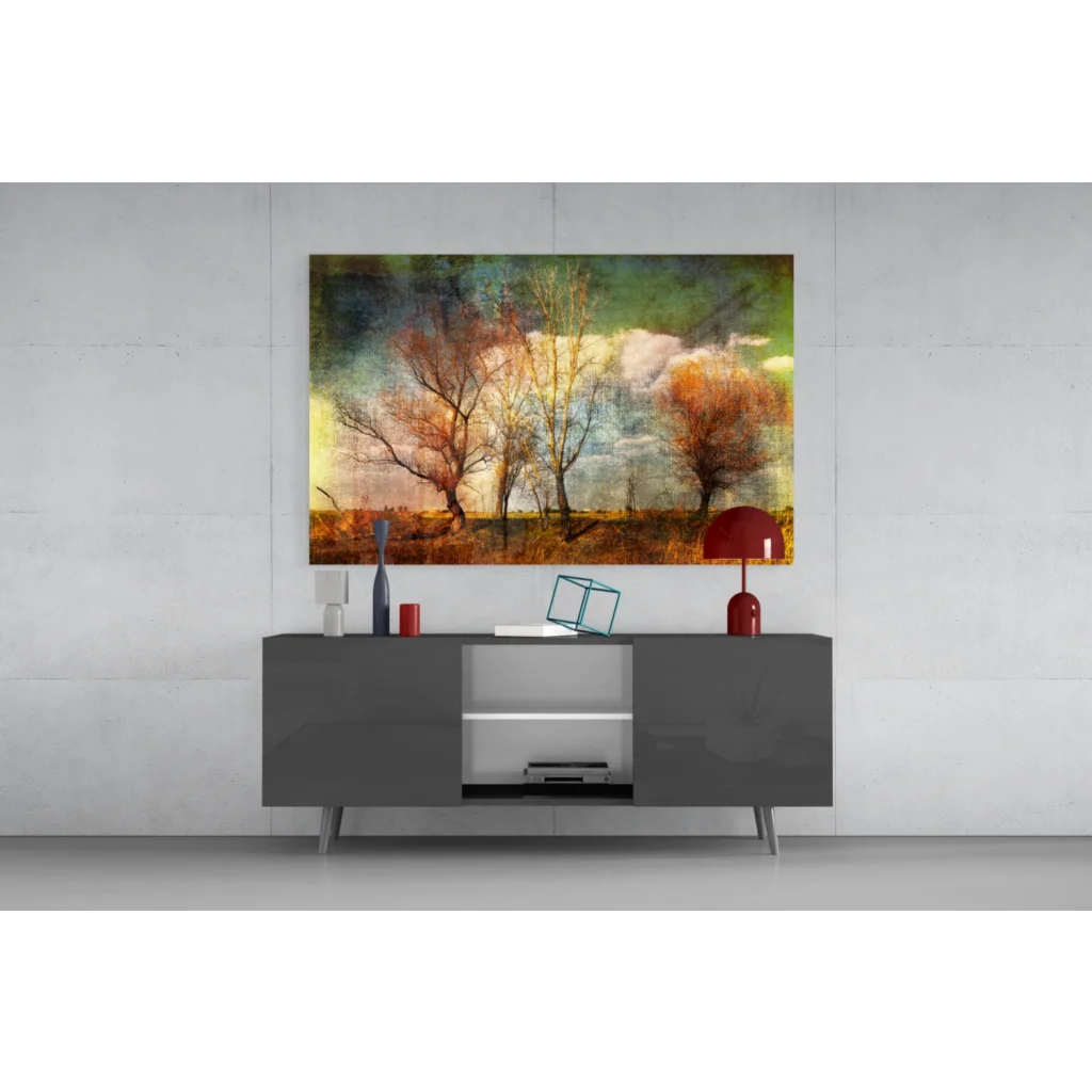 Autumn trees wall art canvas with textured golden sky above gray console
