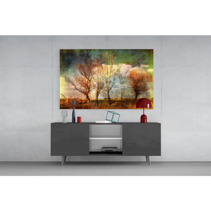 Autumn trees wall art canvas with textured golden sky above gray console