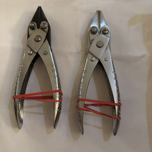 Two pairs of aviation snips sheet metal shears with red handle bands