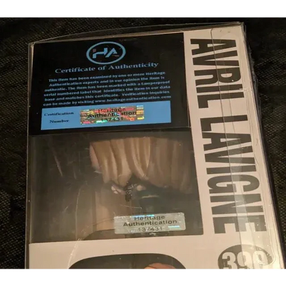 Avril Lavigne autographed Funko Pop collectible figure in packaging with COA