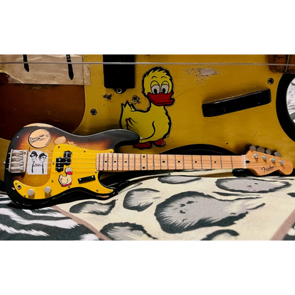 Axe Heaven Fender mini Stratocaster with sunburst finish and adjustable A-frame stand