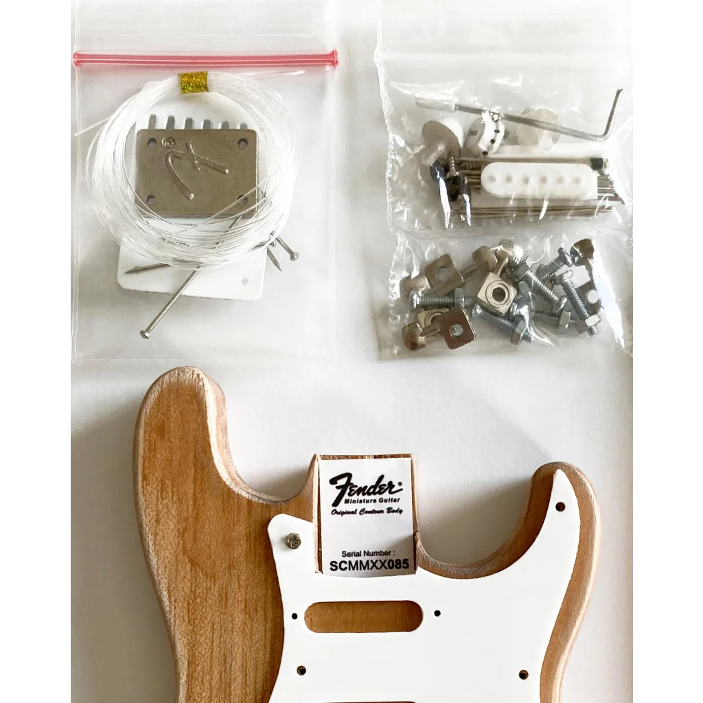 Axe Heaven Fender Strat mini guitar kit with maple neck, white pickguard, and guitar case