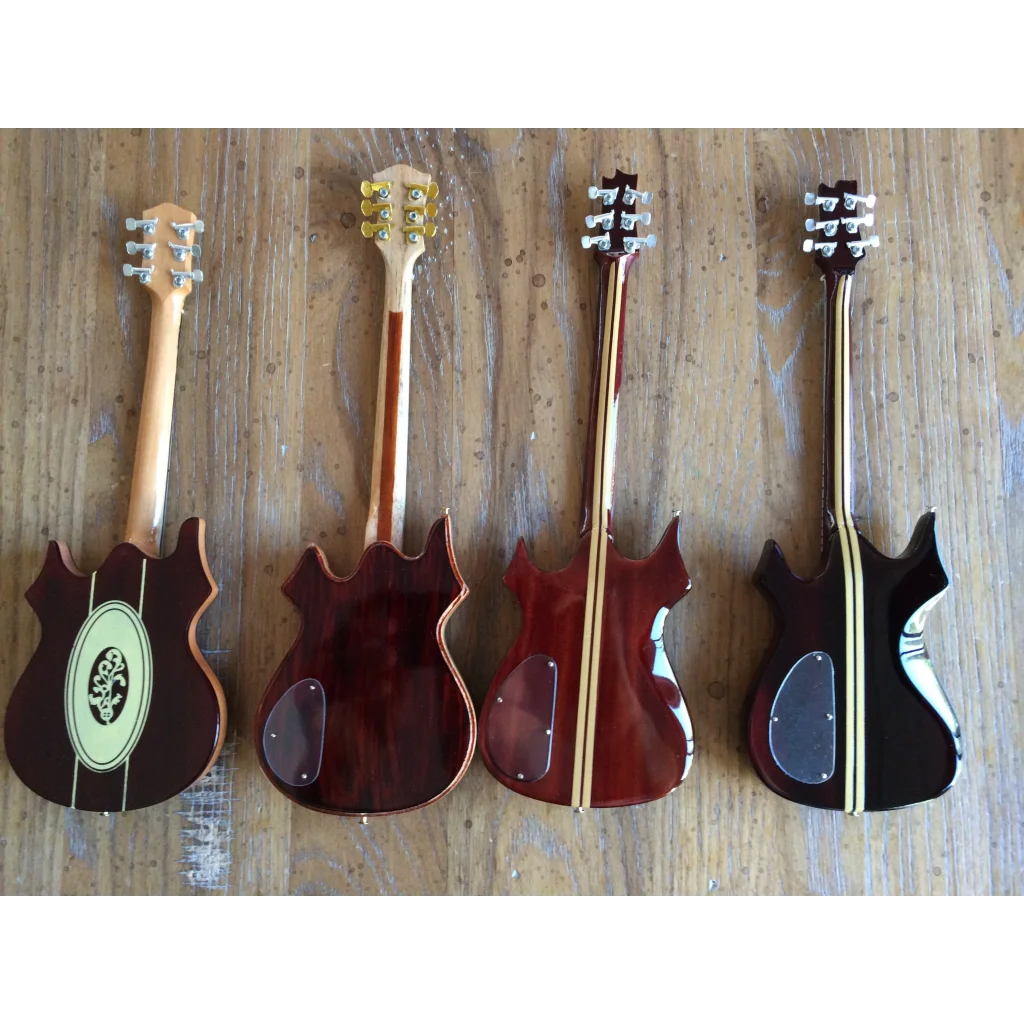 Axe Heaven® 4-string bass with cherry finish, flame maple neck, on adjustable A-frame stand