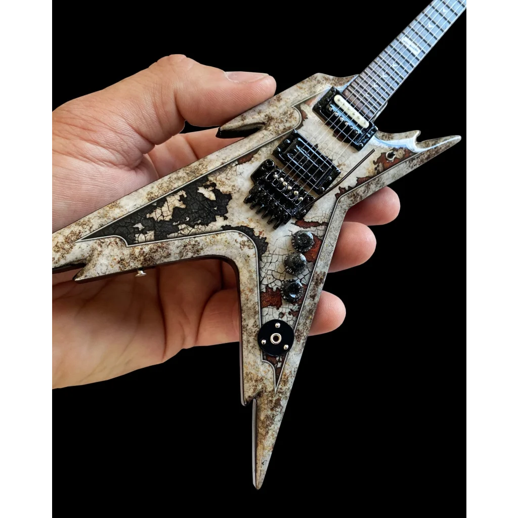 Axe Heaven black and white Jackson guitar mini replica with adjustable A-frame stand