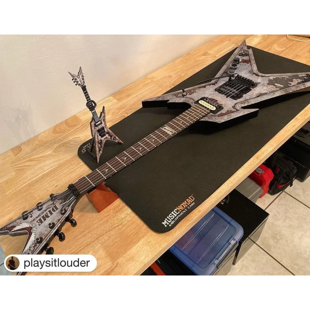 Black and silver Axe Heaven® guitar mini replica with adjustable A-frame stand