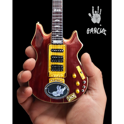 Red Axe Heaven guitar miniature with snake design and stand