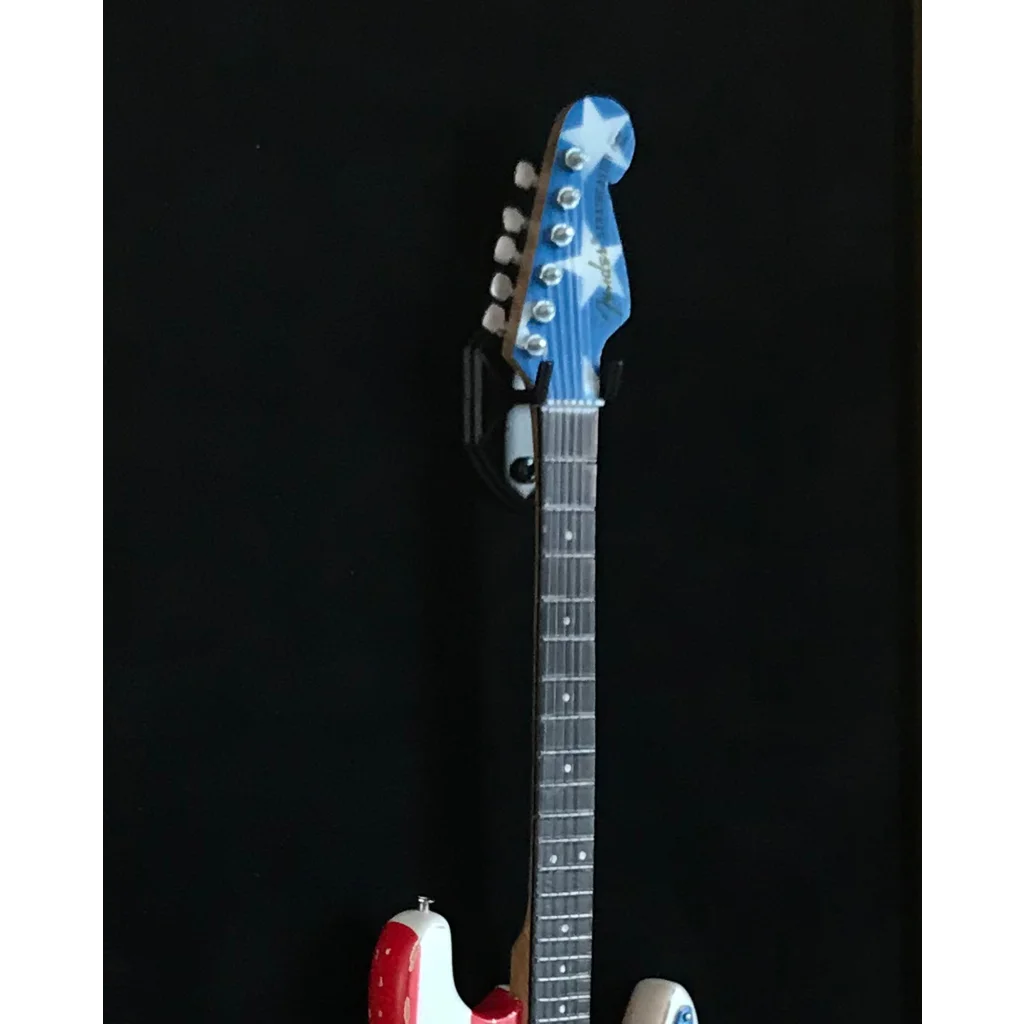 Red and white 2019 Fender American Standard Stratocaster on Axe Heaven wall hangers