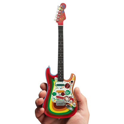 Axe Heaven mini guitar with rainbow designs on adjustable A-frame stand