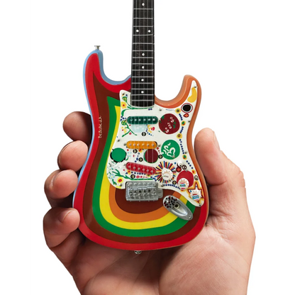 Axe Heaven mini guitar in rainbow colors with stand