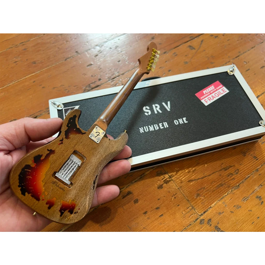 Axe Heaven mini guitar SRV Number One replica with sunburst finish and adjustable A-frame stand