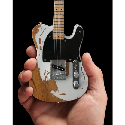 Axe Heaven mini guitar: white Telecaster with aged brown finish and adjustable A-frame stand