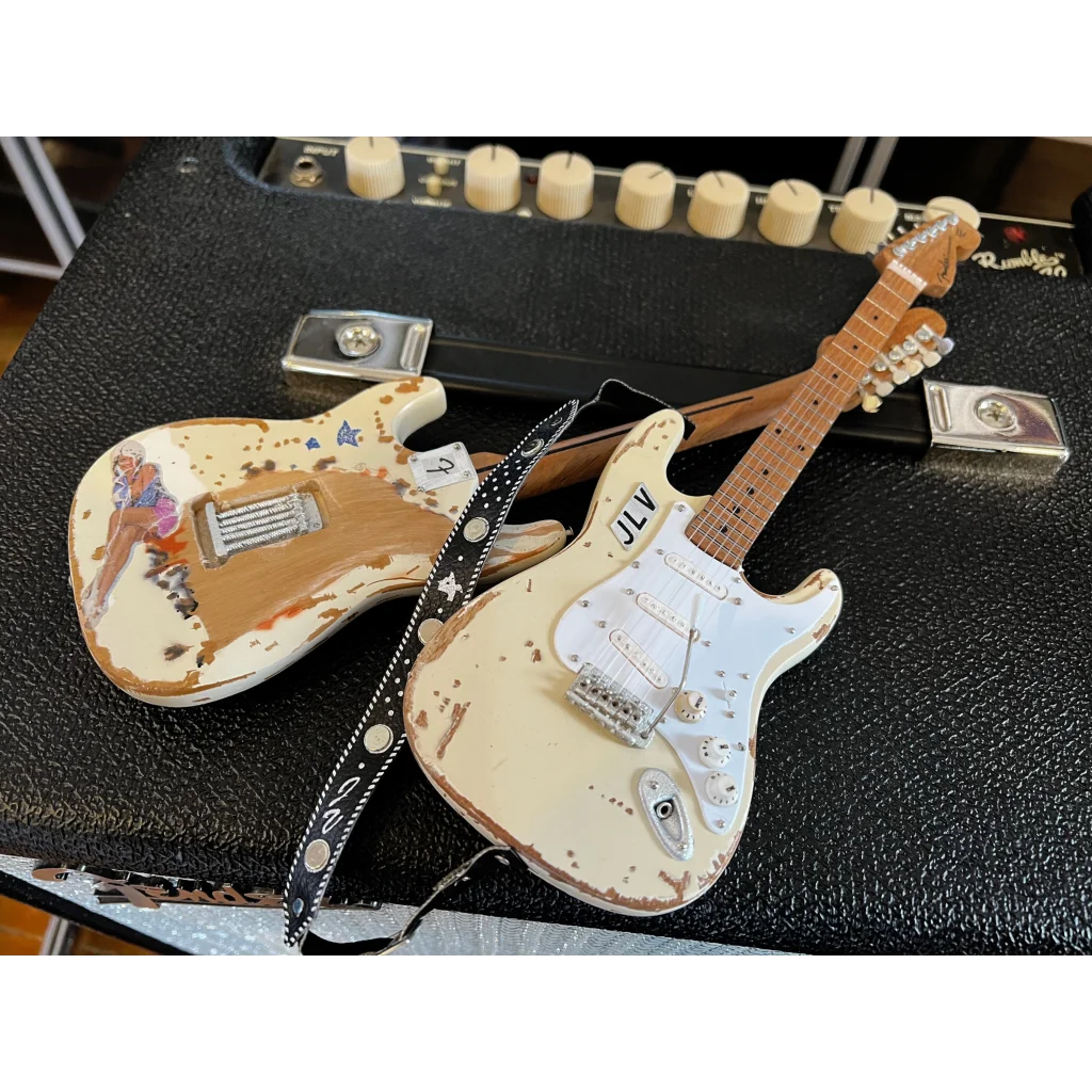 Axe Heaven® mini guitar with distressed cream Stratocaster starburst