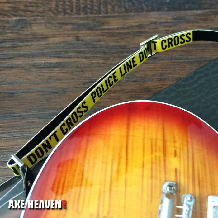 Axe Heaven Police Line Mini Guitar Strap in yellow black with dont cross text