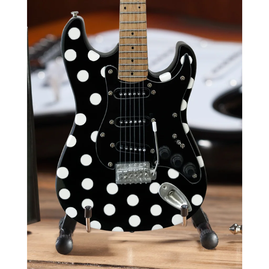 Black and white polka dot Axe Heaven® Buddy Guy Strat guitar with adjustable A-Frame stand