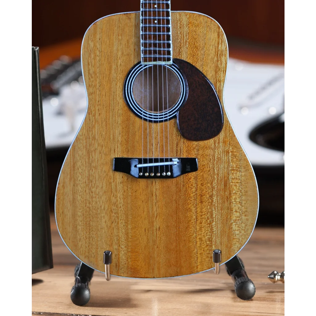 Axe Heaven® miniature guitar replica of glossy natural wood acoustic with black pickguard and adjustable A-frame stand