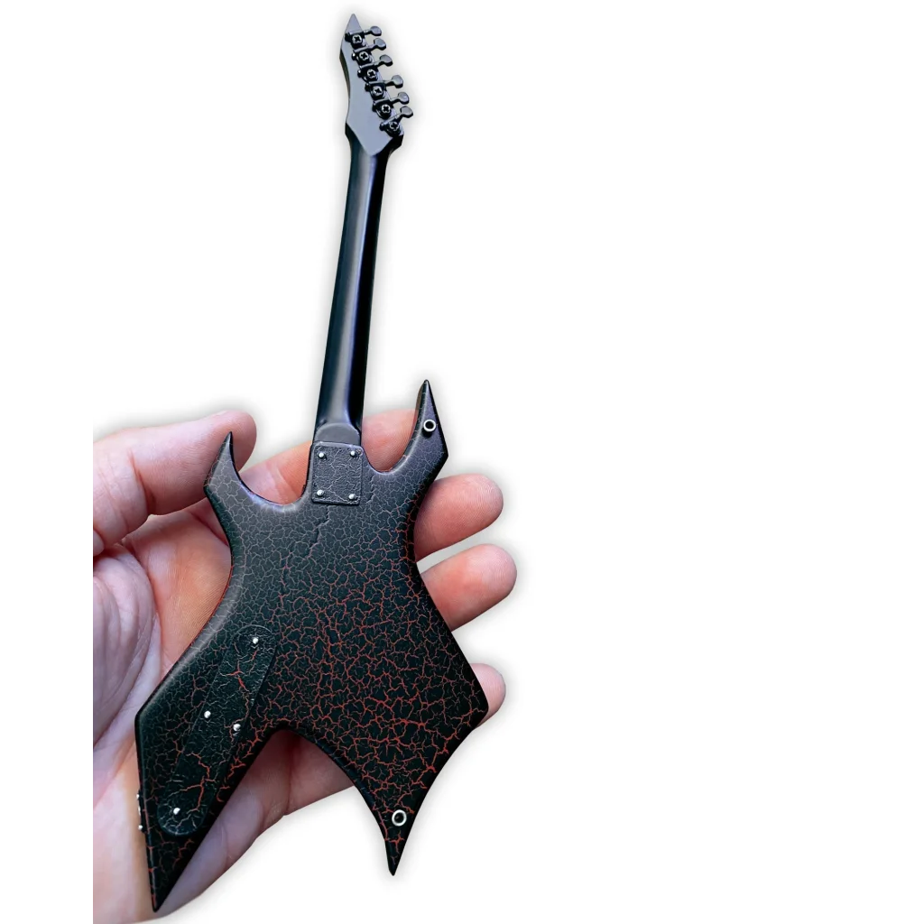 Black and red Axe Heaven guitar keychain with textured finish