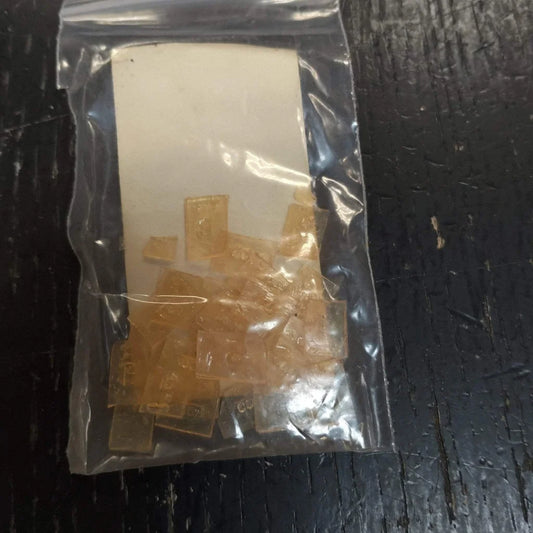 Babe keratin rebonds blonde color bag of translucent amber Lego bricks