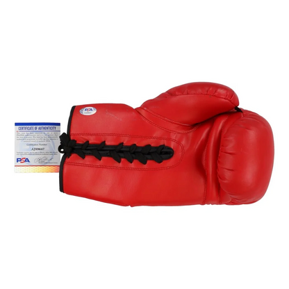 Red boxing glove signed by Badou Jack with PSA DNA authentication showing black laces
