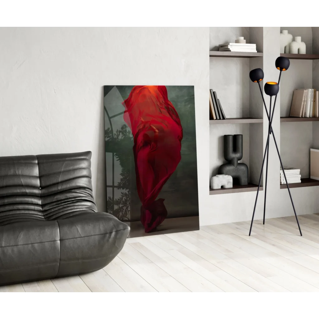 Vibrant red flowing fabric glass wall art on dark green backdrop
