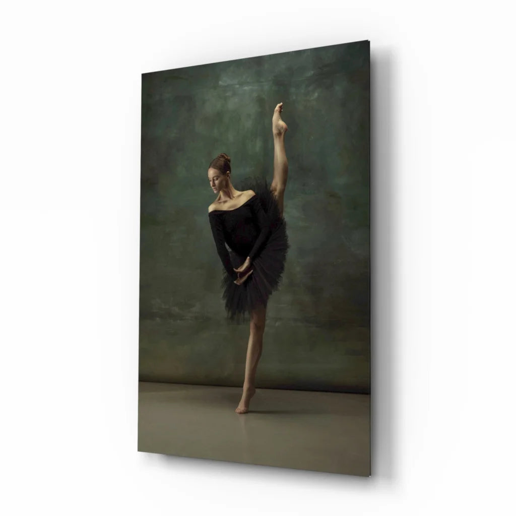 Graceful black ballerina in elegant pose on muted green wall art canvas print