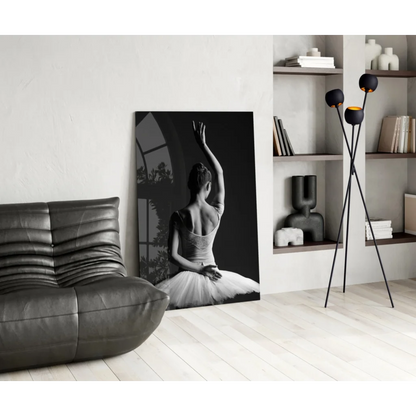 Black and white ballerina wall art canvas print leaning against wall