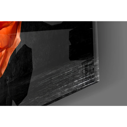 Sleek black glass wall art with flowing orange dancer in motion