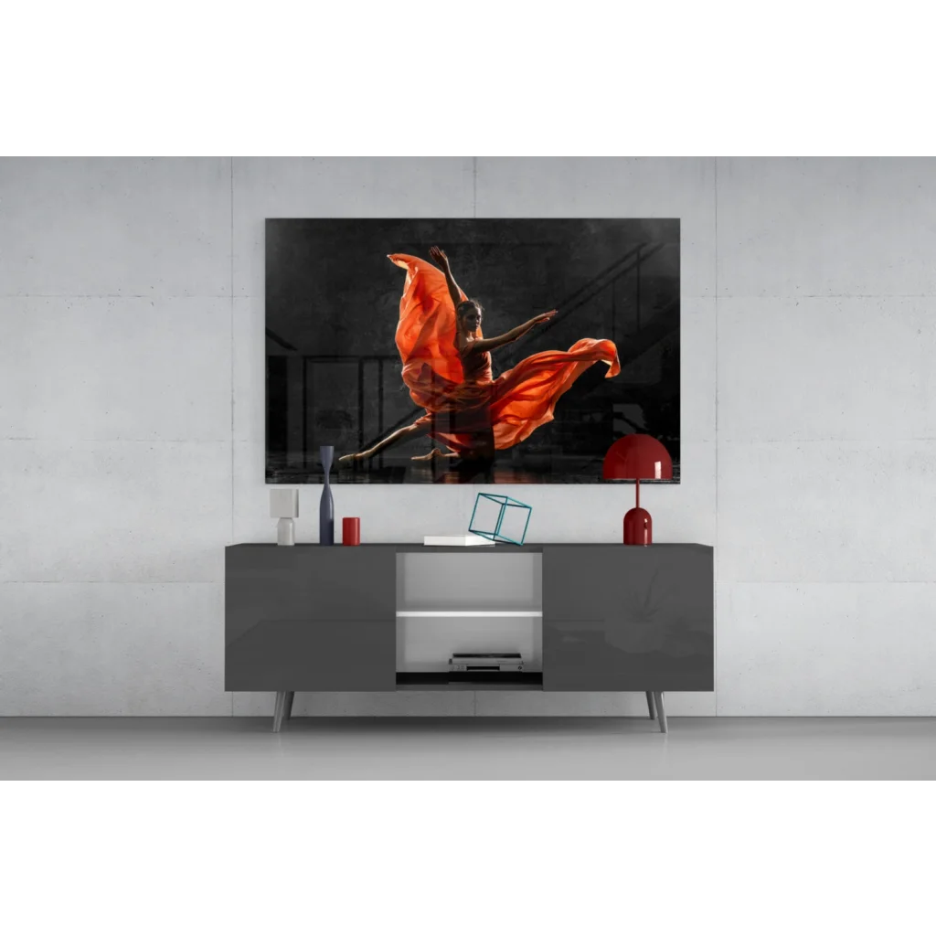 Vibrant orange dancer in flowing motion on glass wall art