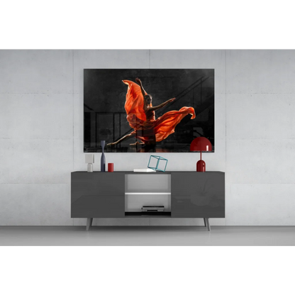 Vibrant orange dancer in flowing motion on glass wall art
