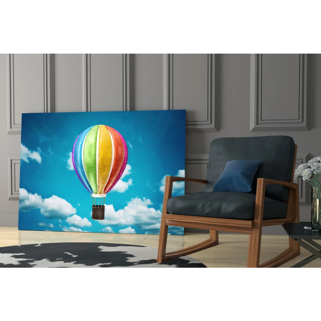 Vibrant rainbow hot air balloon wall art canvas print on blue sky