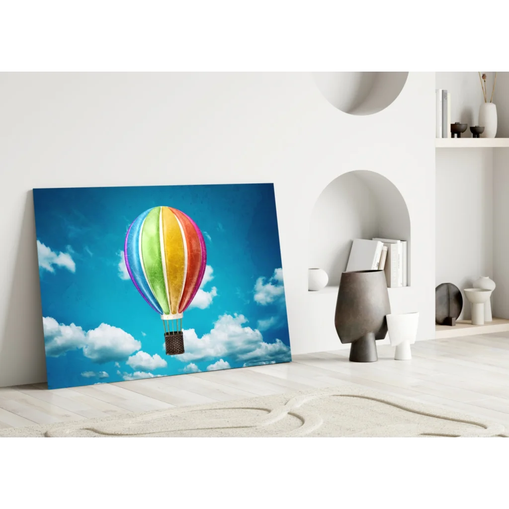 Vibrant rainbow hot air balloon wall art canvas print on blue sky