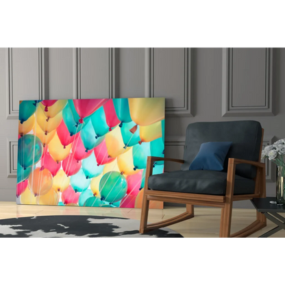 Vibrant colorful balloon burst wall art canvas print in pink teal yellow green