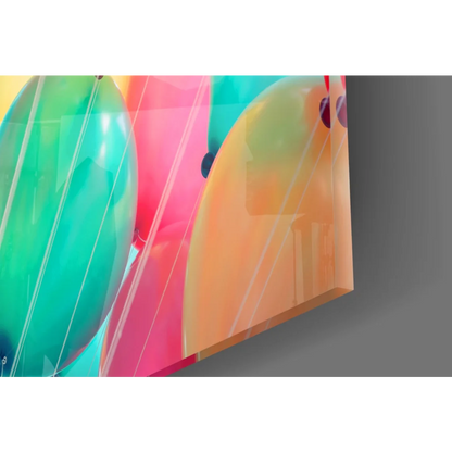 Vibrant glossy balloon burst glass wall art in green pink orange hues