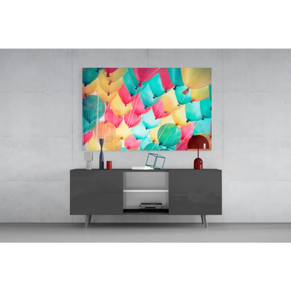 Vibrant colorful balloon burst wall art canvas print in teal, yellow, pink, orange