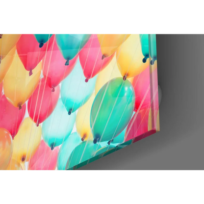 Vibrant colorful balloon glass wall art print with pink yellow teal green shades