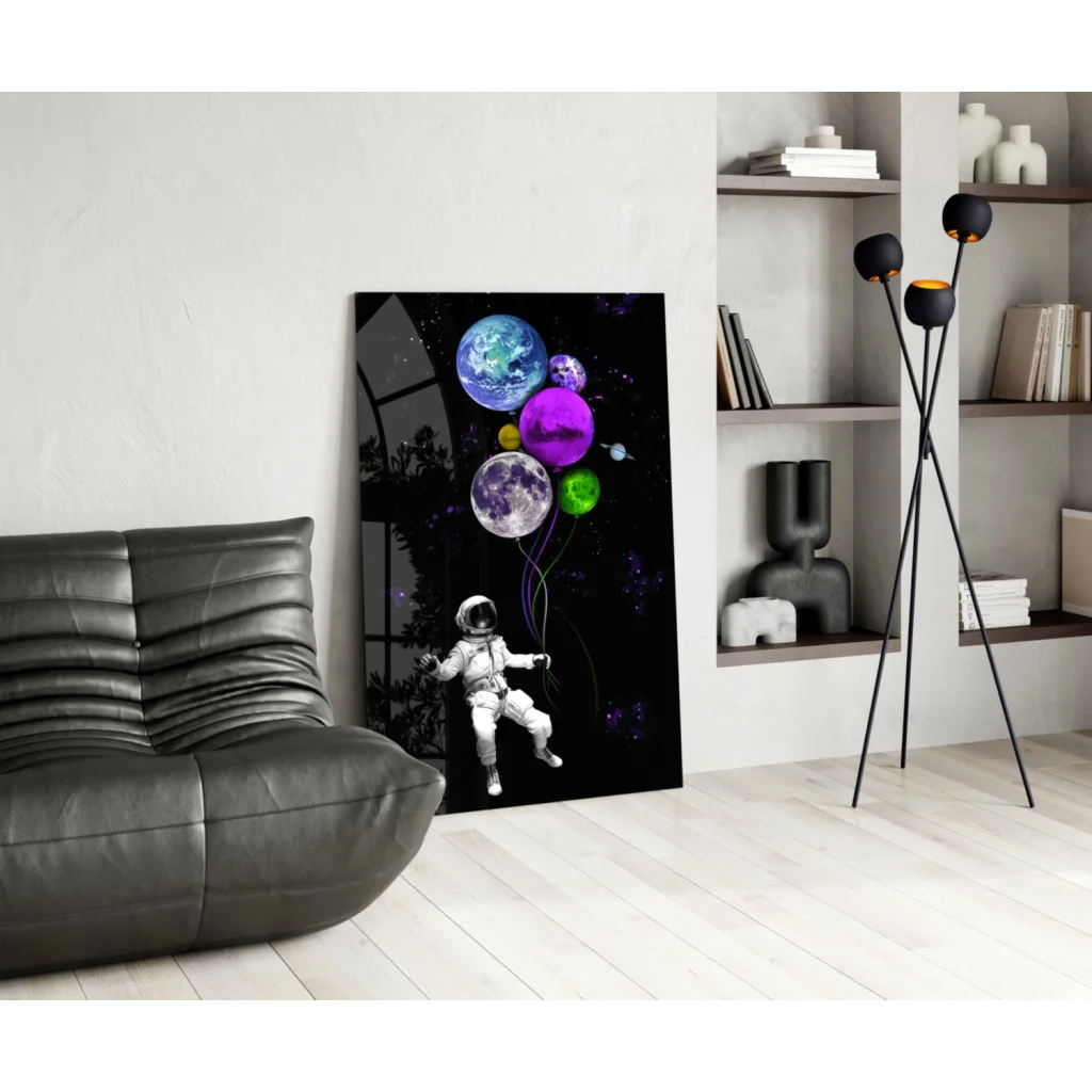Sleek black canvas wall art print of white astronaut floating among colorful planets