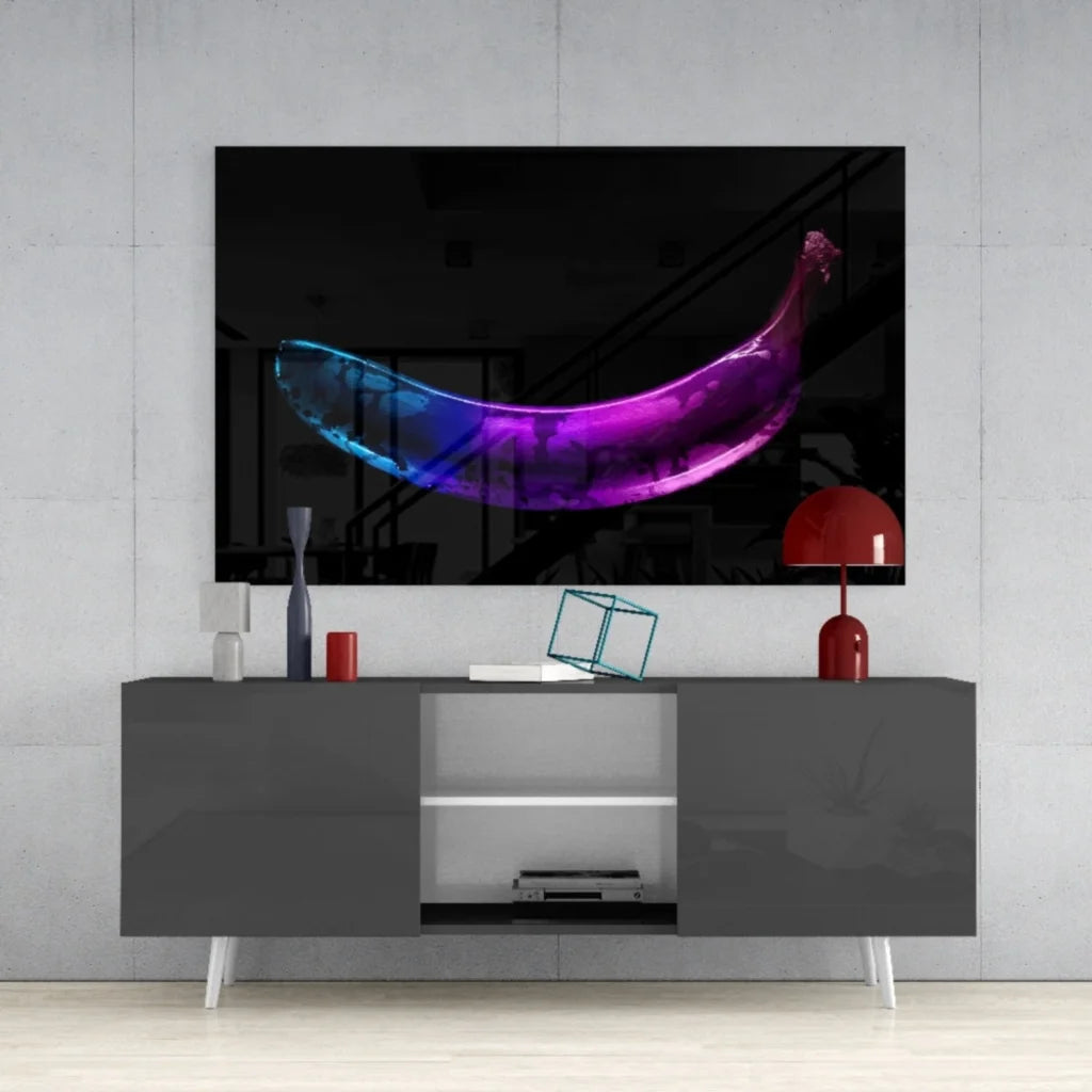 Vibrant iridescent banana glass wall art in electric purple blue glow