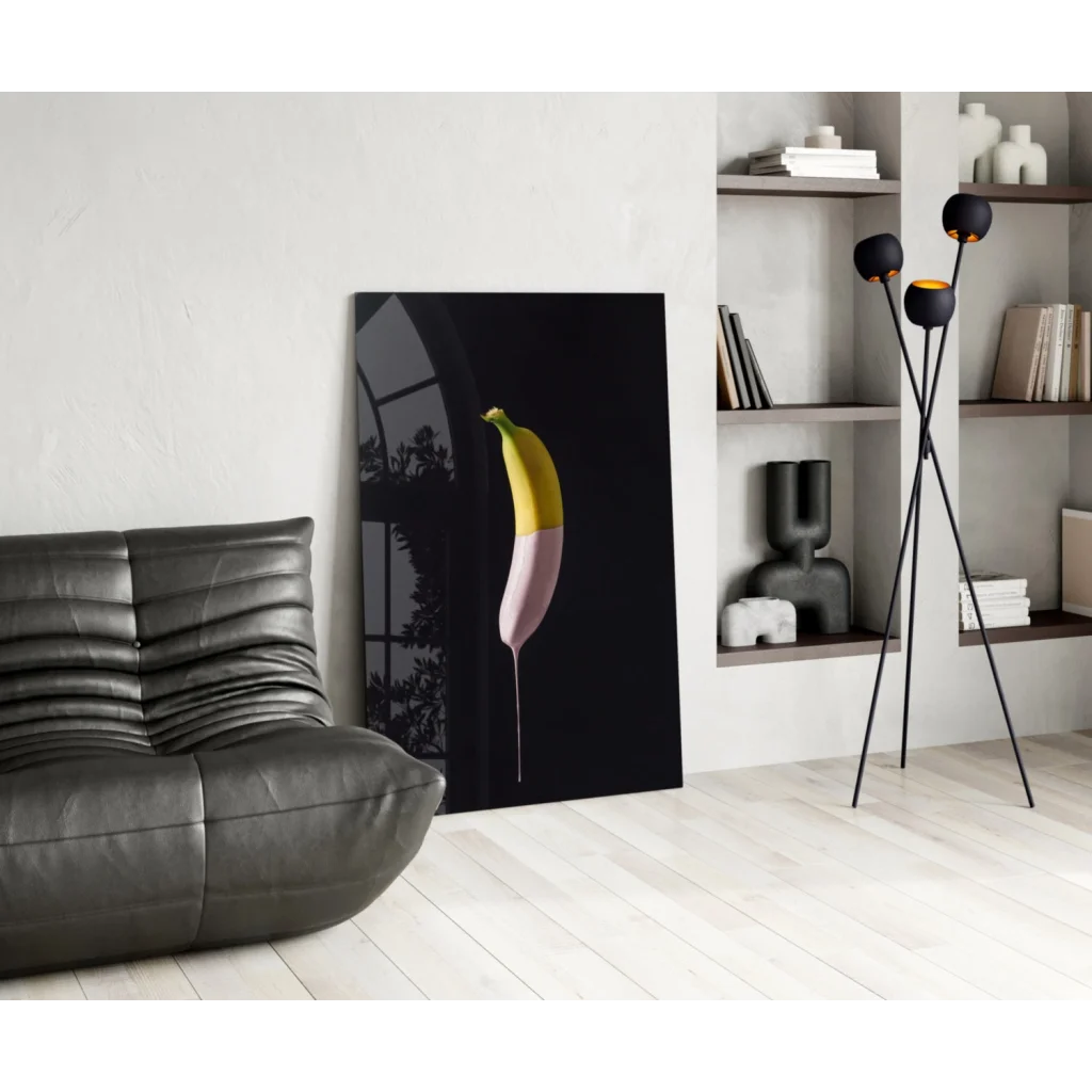 Vibrant two-toned banana glass wall art print in yellow and pink