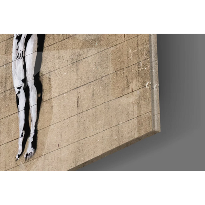 Minimalist Banksy stencil legs graffiti on beige concrete wall art