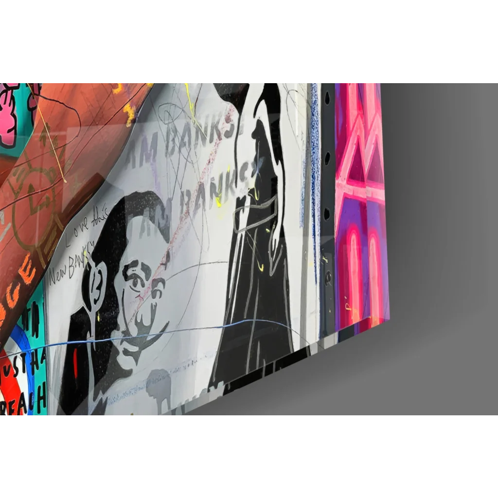 Stylized black-and-white glass wall art portrait of man with graffiti text