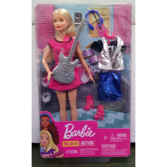 Barbie Doll Rockstar with electric guitar in pink outfit