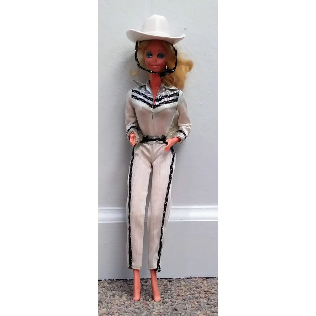 Vintage 1980 Western Barbie Doll in black and white cowboy outfit with hat