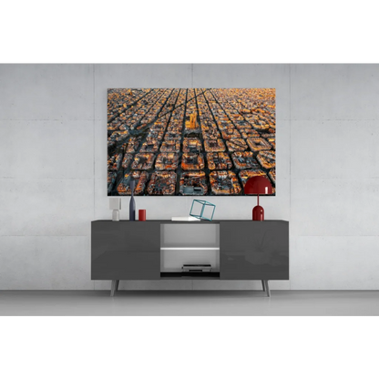 Vibrant aerial cityscape glass wall art with golden buildings and central yellow structure