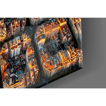 Aerial cityscape glass wall art print on angled canvas with golden lighting