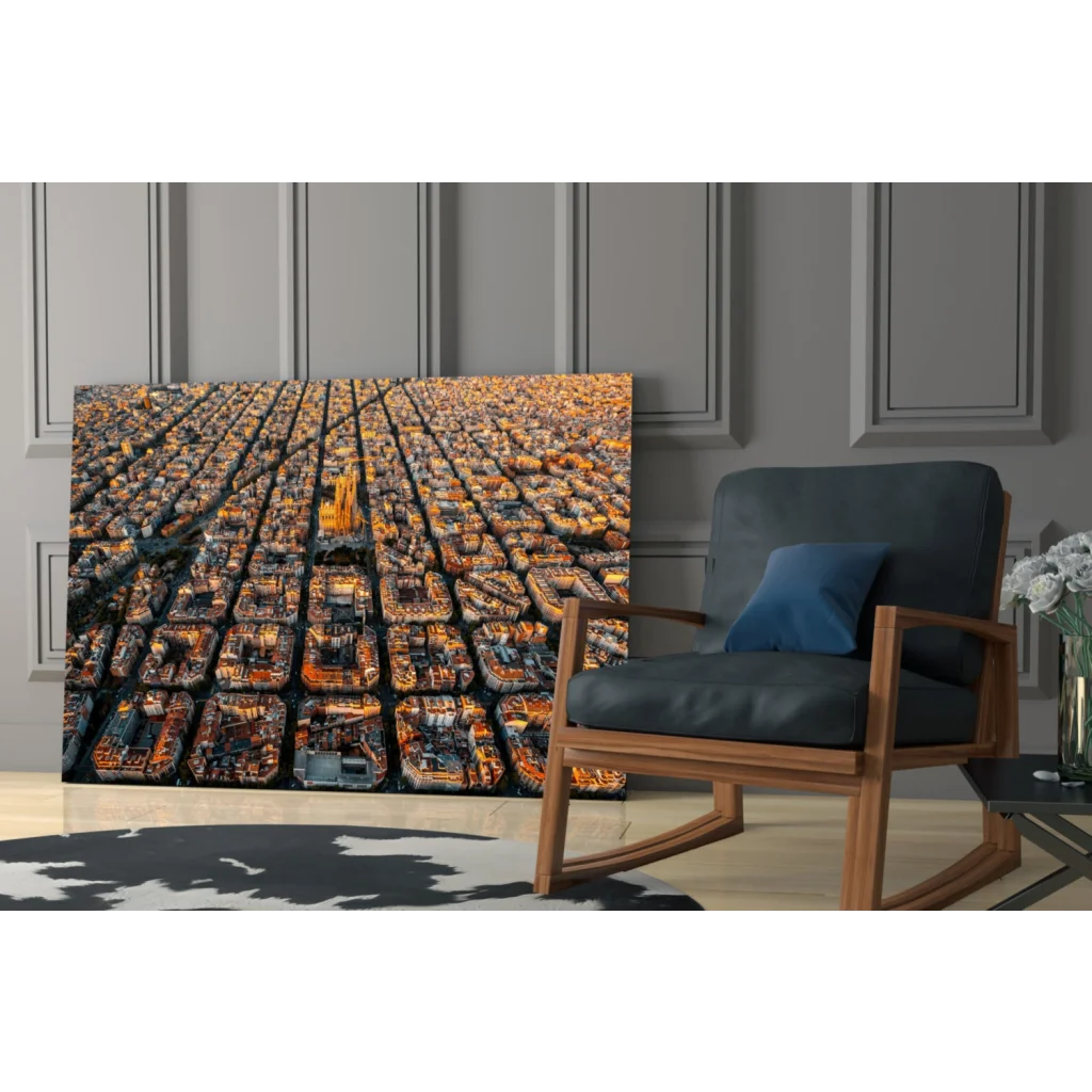 Aerial cityscape glass wall art with orange buildings in golden light