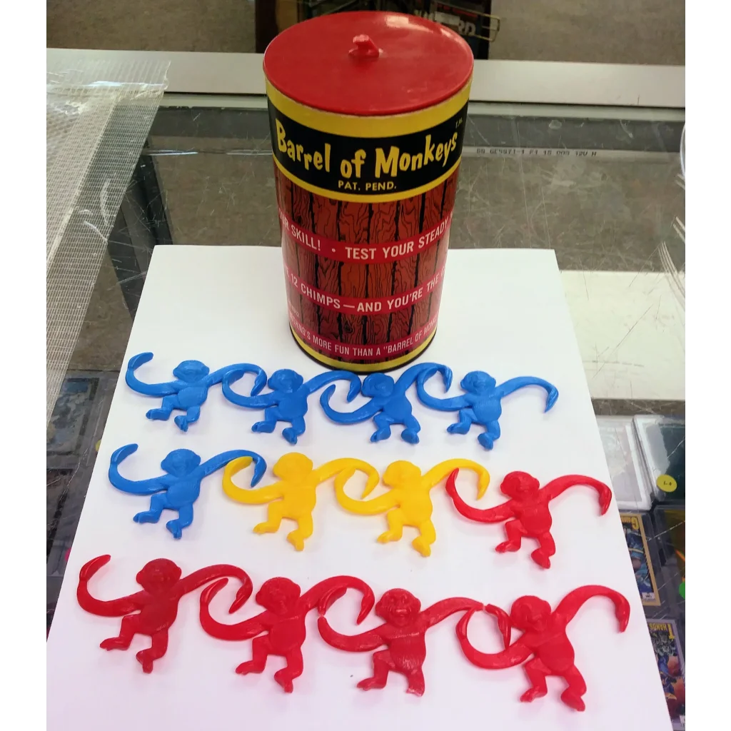 Vintage 1965 Lakeside Toys plastic monkeys game in red, yellow, blue