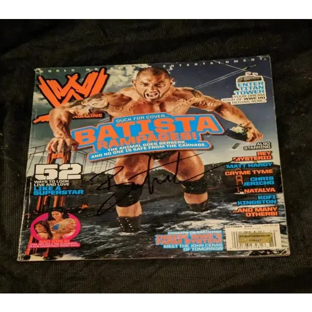 Autographed WWE magazine featuring Batista on the cover, Batista Signed WWE collectible