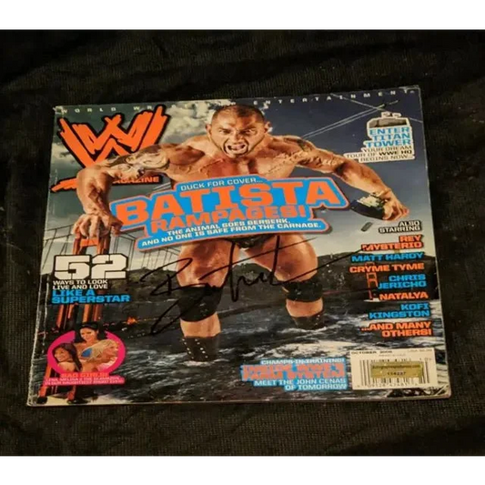 Autographed WWE magazine featuring Batista on the cover, Batista Signed WWE collectible