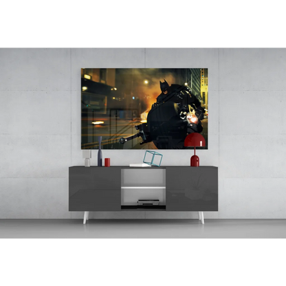 Black Batman action figure with glowing red eyes on glass wall art