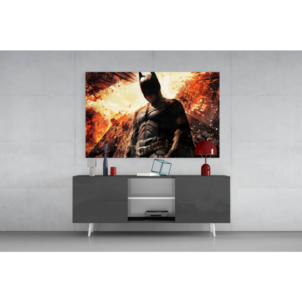Batman action figure in black armored suit on gray table, glass wall art