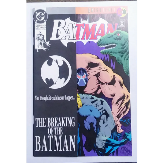 Batman Issue 497 comic cover with Bane breaking Bat, green dinosaur and bat symbol